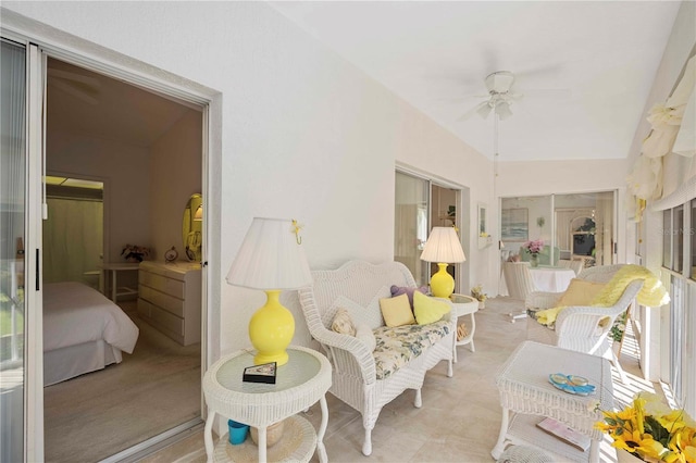 sunroom with ceiling fan