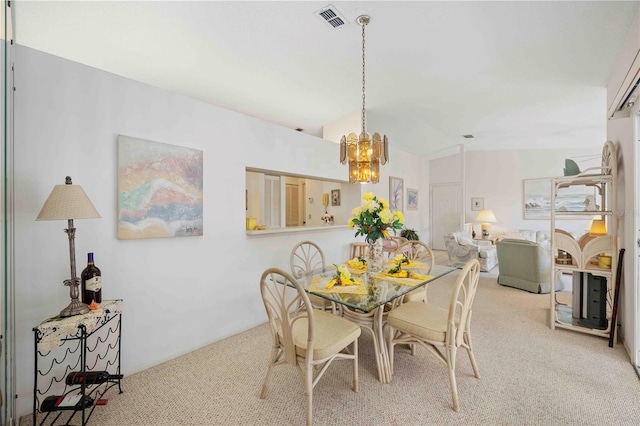 carpeted dining room featuring visible vents, an inviting chandelier, and vaulted ceiling