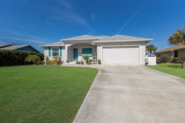 view of front of house with a garage, a shingled roof, concrete driveway, stucco siding, and a front lawn