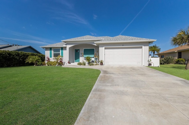 6 Bunker Cir, Rotonda West, FL 33947 - view of front of home with an attached garage, a front yard, concrete driveway, and stucco siding