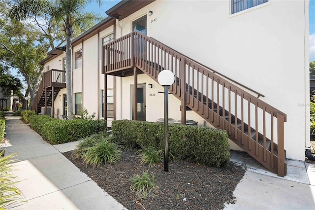 view of property with stairway