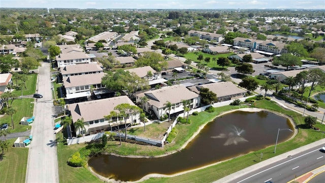 aerial view with a residential view and a water view