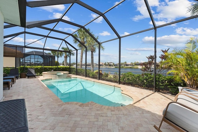 view of pool featuring a water view, a patio area, a pool with connected hot tub, and a lanai