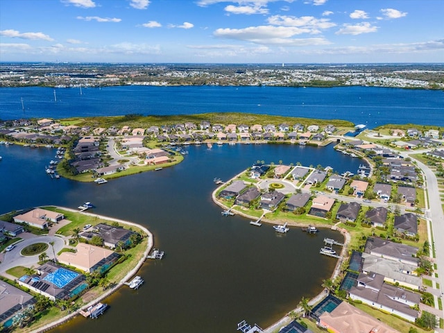 bird's eye view featuring a water view and a residential view