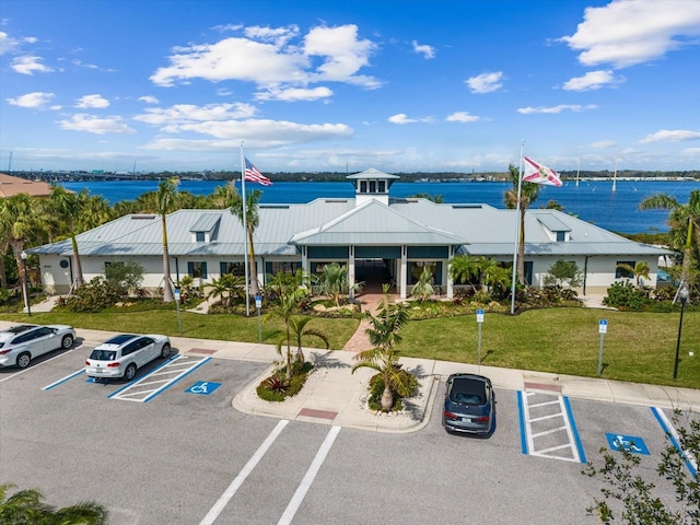 exterior space with a water view