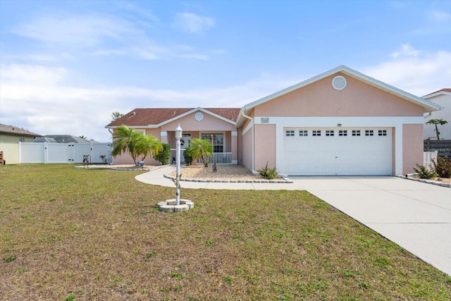 ranch-style house featuring stucco siding, concrete driveway, fence, a garage, and a front lawn