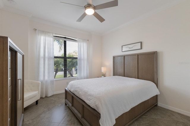 bedroom with baseboards, ceiling fan, and crown molding