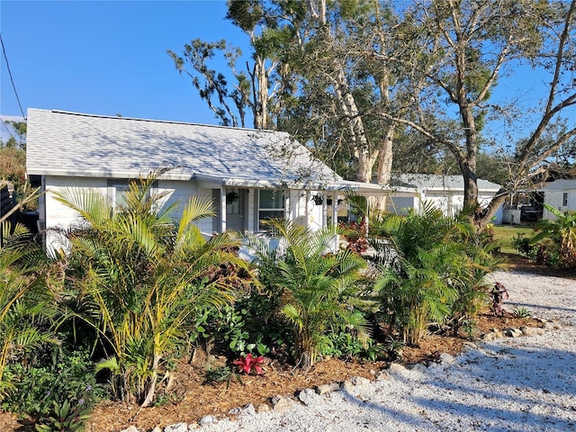 view of front of home featuring a shingled roof