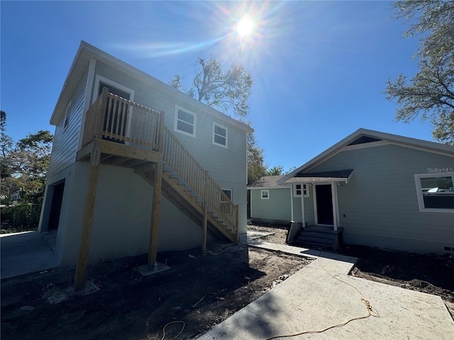 back of property with entry steps