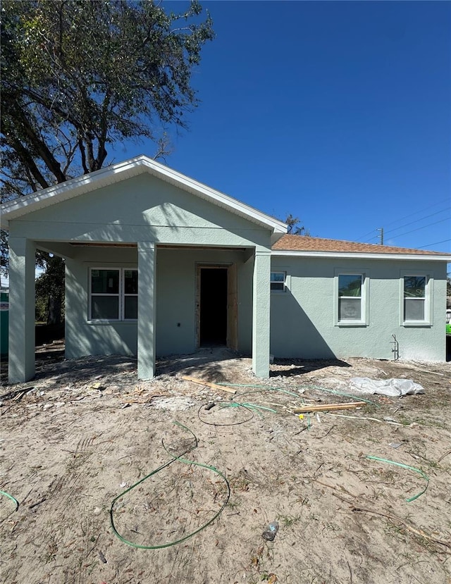 view of front of home with stucco siding