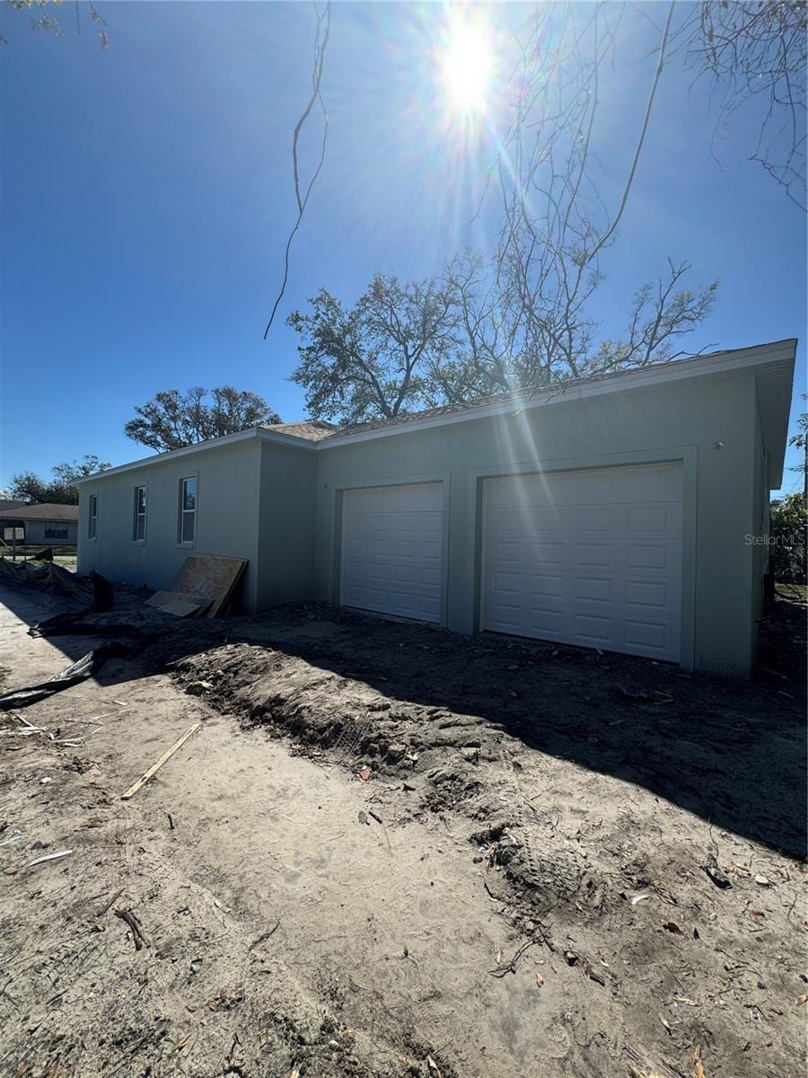 garage with driveway