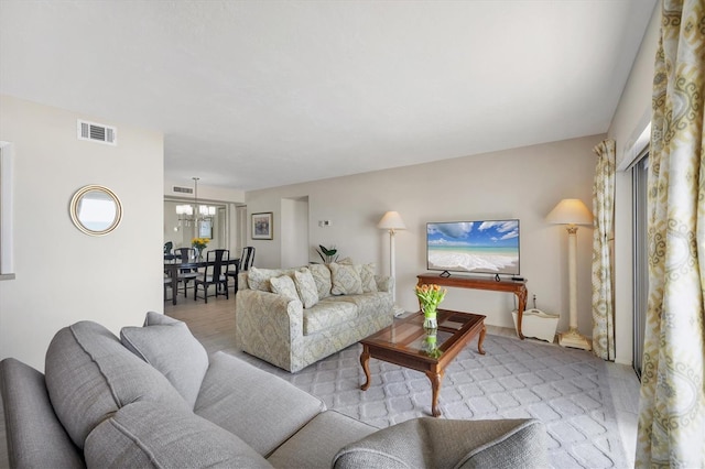 living room featuring visible vents