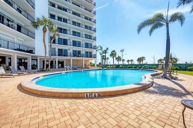 community pool featuring a patio