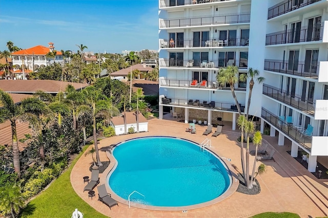 community pool with a patio