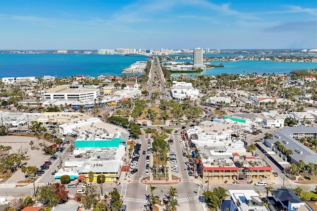 birds eye view of property featuring a view of city and a water view