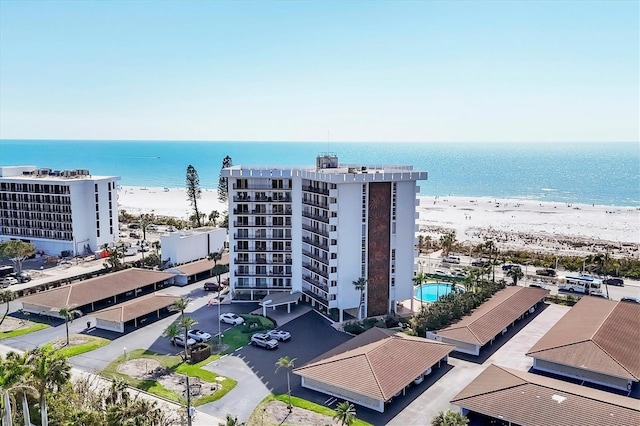 bird's eye view with a view of the beach and a water view