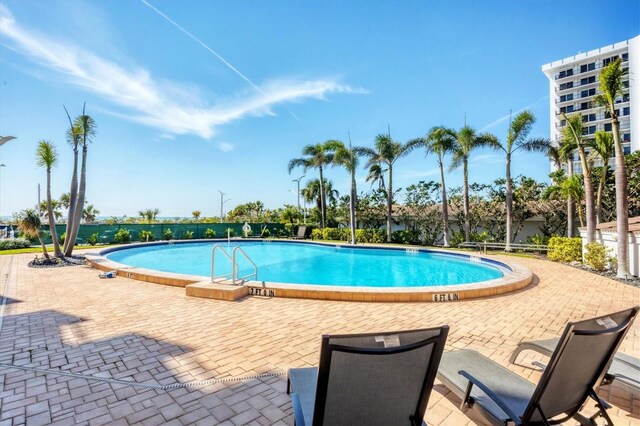 community pool featuring a patio