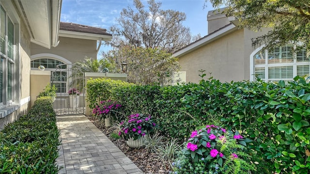 exterior space featuring a gate and fence