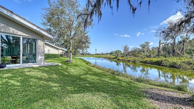 view of yard with a water view