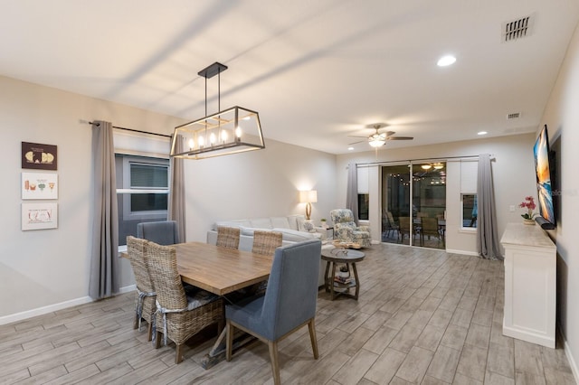 dining room featuring wood finish floors, recessed lighting, visible vents, ceiling fan, and baseboards