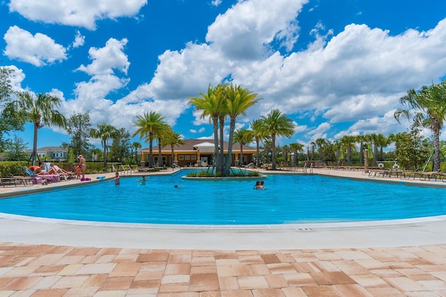 pool with a patio