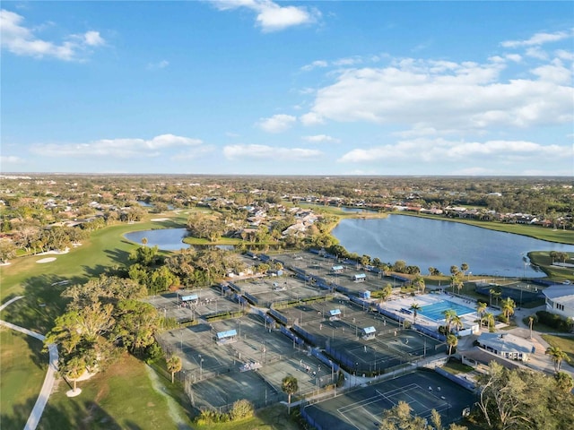 birds eye view of property featuring golf course view and a water view