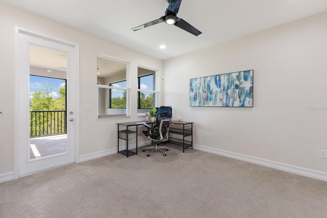 carpeted office space featuring plenty of natural light, baseboards, a ceiling fan, and recessed lighting