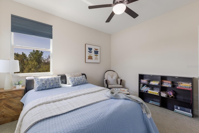 carpeted bedroom featuring a ceiling fan