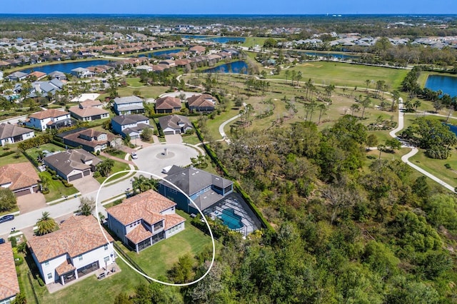 birds eye view of property featuring a residential view and a water view