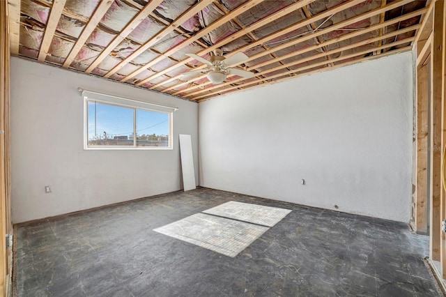 basement with ceiling fan