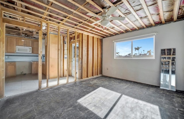 miscellaneous room featuring a ceiling fan