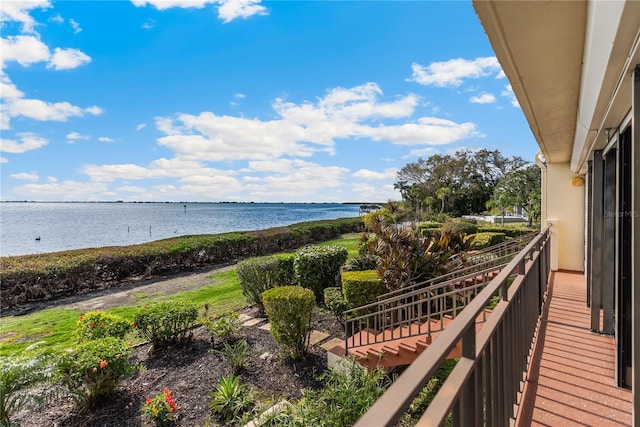 balcony featuring a water view