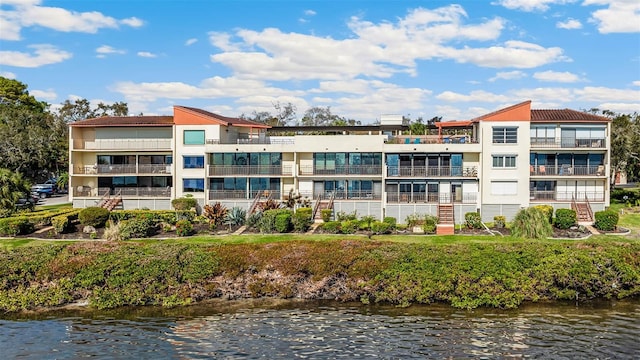 view of building exterior featuring a water view