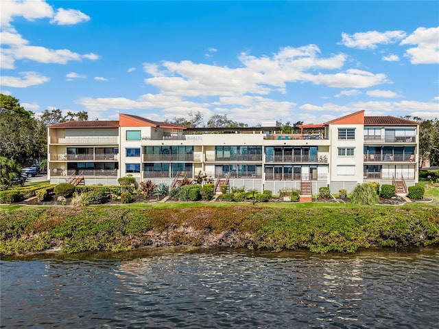 exterior space with a water view