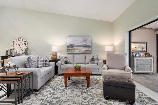 living room with vaulted ceiling