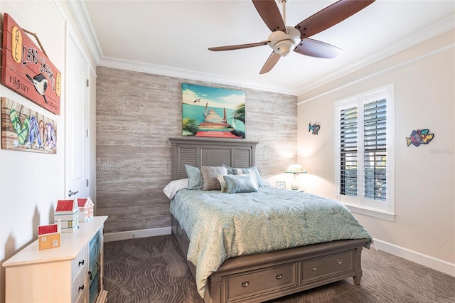 bedroom with dark colored carpet, ornamental molding, and baseboards