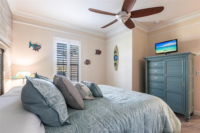 bedroom with a ceiling fan and crown molding