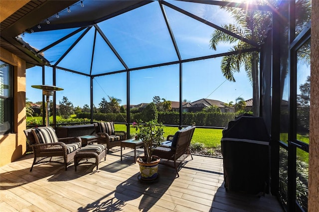 view of patio / terrace featuring a lanai, a deck, and an outdoor hangout area