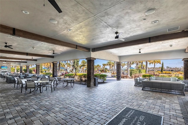 view of patio featuring visible vents, ceiling fan, and an outdoor hangout area