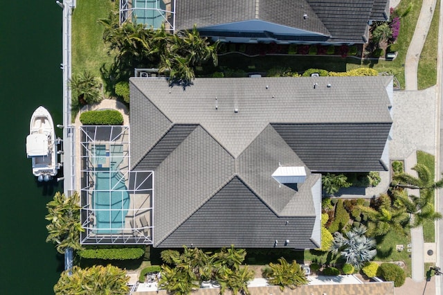 drone / aerial view featuring a water view