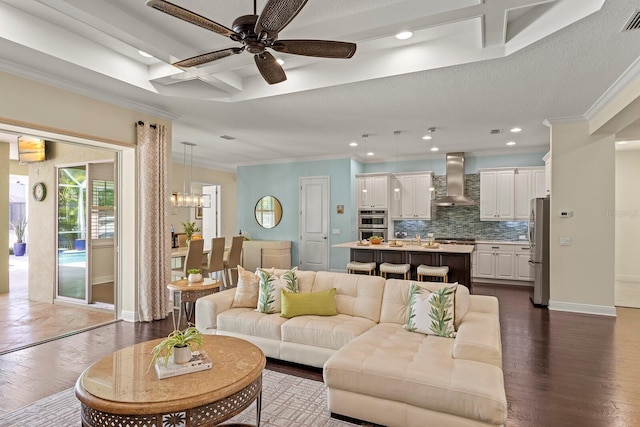 living room featuring crown molding, baseboards, coffered ceiling, and dark wood-style flooring