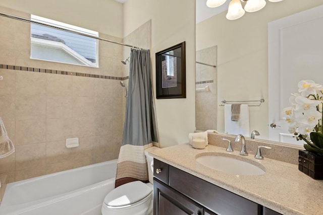 full bathroom featuring shower / tub combo, vanity, and toilet