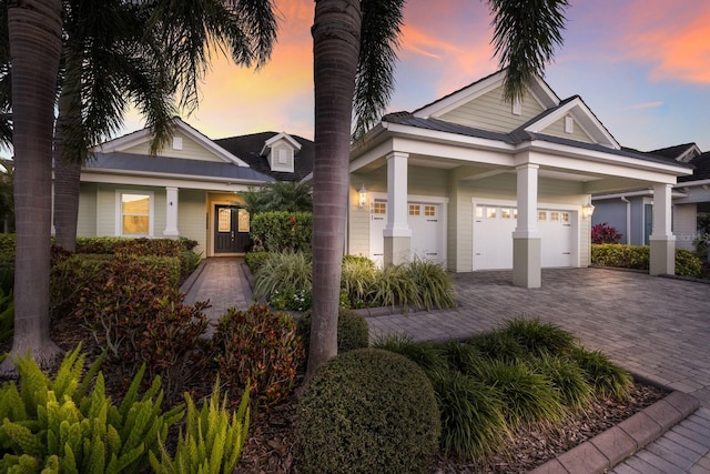 view of front of property featuring decorative driveway