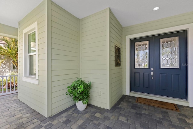 entrance to property with a porch