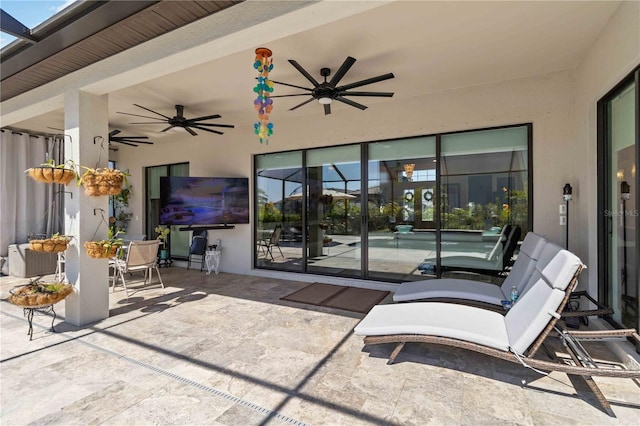 view of patio / terrace with ceiling fan