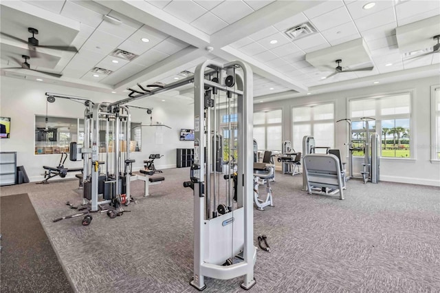 workout area with carpet floors, visible vents, and ceiling fan