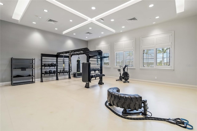 workout room with baseboards, visible vents, and recessed lighting