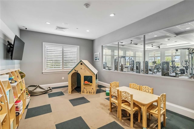 recreation room featuring visible vents, baseboards, coffered ceiling, beam ceiling, and recessed lighting