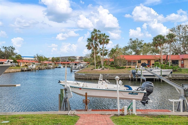 view of dock with a water view and boat lift