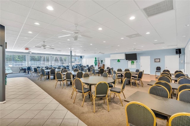 dining area with recessed lighting, a paneled ceiling, visible vents, light carpet, and light tile patterned flooring